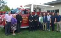 Fort Erie dignitaries around an antique fire truck