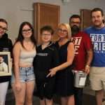 Memorial concert helps sister bury long-missing brother with parents